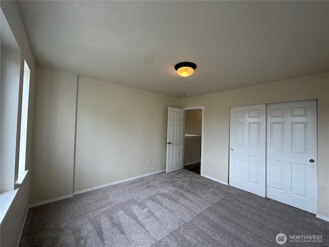 15328 104th Ave SE, Yelm, WA 98597 - unfurnished bedroom featuring carpet flooring and a closet