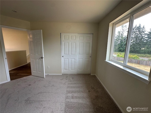 15328 104th Ave SE, Yelm, WA 98597 - unfurnished bedroom with carpet floors and a closet