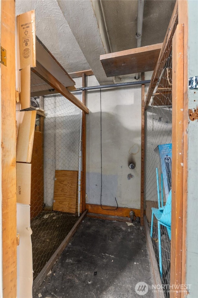 4725 15th Ave NE Unit 22, Seattle, WA 98105 - miscellaneous room featuring unfinished concrete flooring