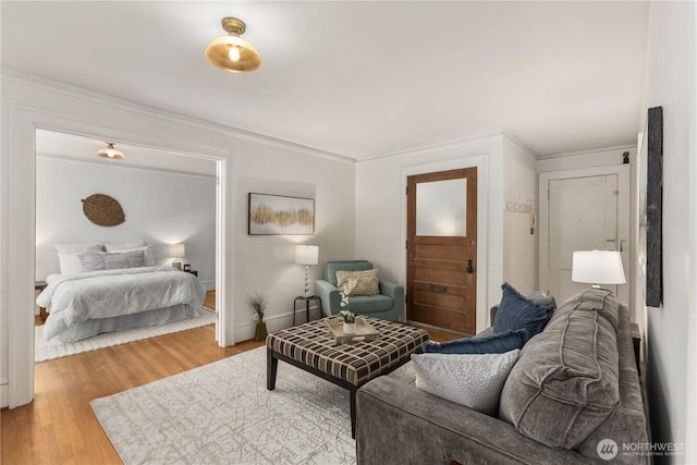 4725 15th Ave NE Unit 22, Seattle, WA 98105 - bedroom featuring wood finished floors and ornamental molding
