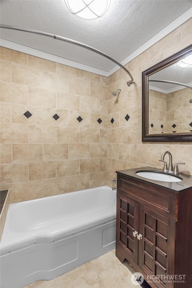 2717 Bench Dr, Aberdeen, WA 98520 - full bathroom with tile walls, vanity, bathtub / shower combination, tile patterned floors, and a textured ceiling