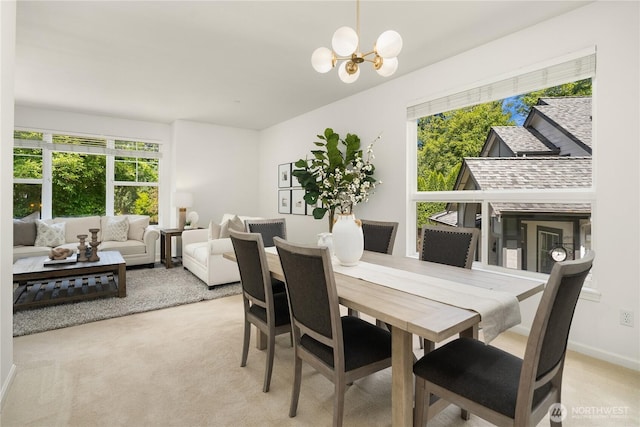 16760 128th Pl NE, Woodinville, WA 98072 - carpeted dining space with plenty of natural light and a chandelier