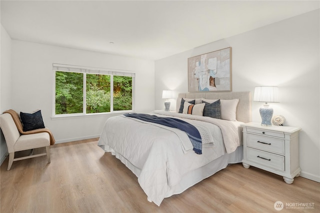 16760 128th Pl NE, Woodinville, WA 98072 - bedroom with light wood-style floors