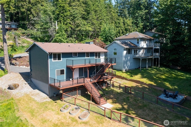 1668 Sapphire Trl, Bellingham, WA 98226 - rear view of house with stairs, a deck, and a fenced backyard