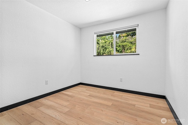 1668 Sapphire Trl, Bellingham, WA 98226 - empty room with hardwood / wood-style flooring and baseboards