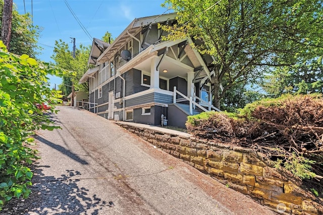715 W Howe St, Seattle, WA 98119 - view of front facade with asphalt driveway