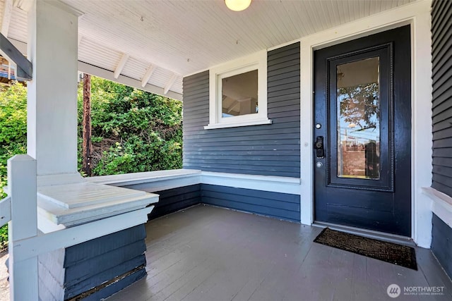 715 W Howe St, Seattle, WA 98119 - view of exterior entry featuring a porch