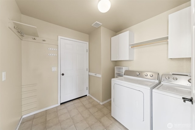 456 Sorensen St, Buckley, WA 98321 - laundry area featuring washer and clothes dryer and cabinet space
