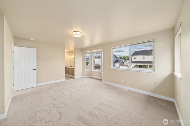 456 Sorensen St, Buckley, WA 98321 - unfurnished room with carpet floors and baseboards