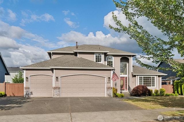 456 Sorensen St, Buckley, WA 98321 - view of front facade with a garage, driveway, brick siding, and a shingled roof