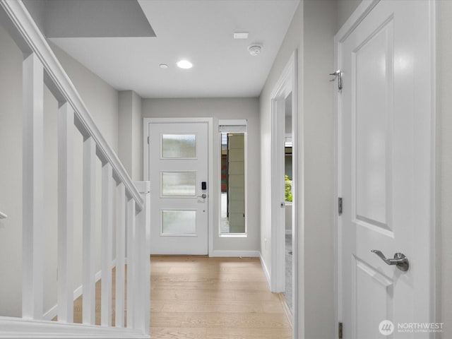 509 237th Pl SE Unit D, Bothell, WA 98021 - foyer with light wood finished floors, stairs, and recessed lighting