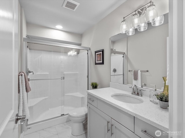 509 237th Pl SE Unit D, Bothell, WA 98021 - bathroom featuring vanity, a stall shower, marble finish flooring, and recessed lighting