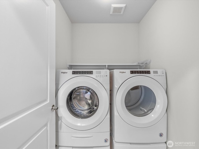 509 237th Pl SE Unit D, Bothell, WA 98021 - laundry room featuring washer and clothes dryer