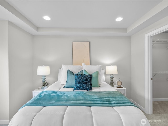 509 237th Pl SE Unit D, Bothell, WA 98021 - carpeted bedroom with a spacious closet, a tray ceiling, a closet, and recessed lighting