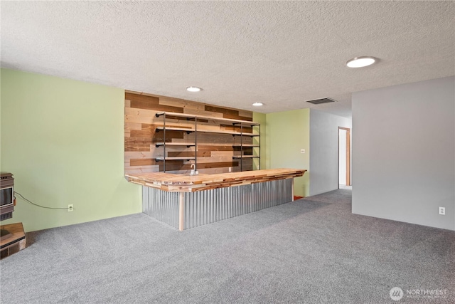618 Main St, Vader, WA 98593 - bar area with carpet floors, a textured ceiling, and recessed lighting