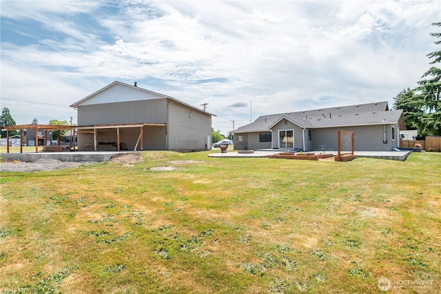 618 Main St, Vader, WA 98593 - back of property with a lawn and a patio