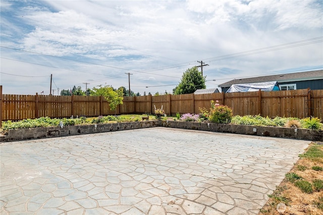 618 Main St, Vader, WA 98593 - fenced backyard featuring a patio