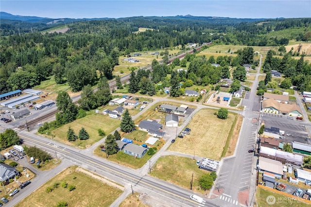 618 Main St, Vader, WA 98593 - aerial view of property and surrounding area with a heavily wooded area
