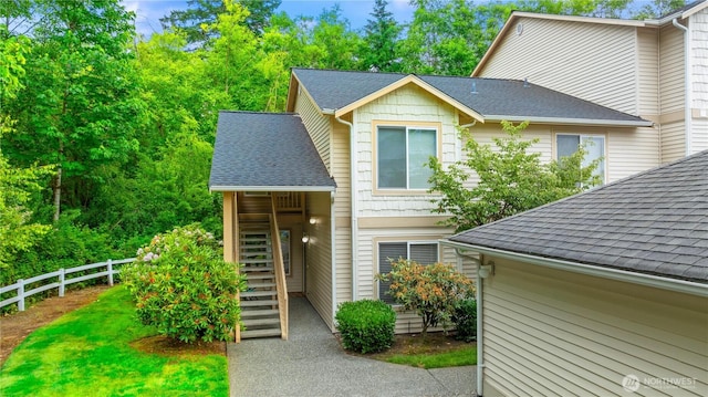 723 114th St SW Unit Y101, Everett, WA 98204 - view of front of home featuring stairway and a shingled roof