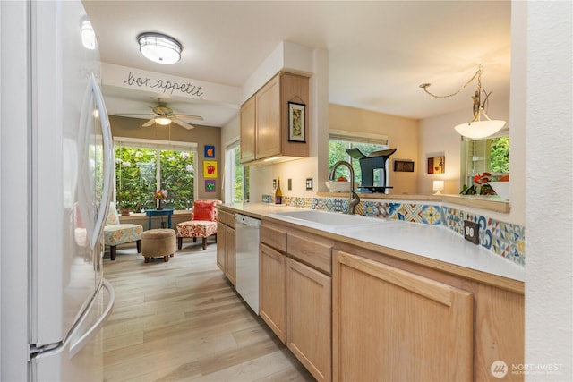 723 114th St SW Unit Y101, Everett, WA 98204 - kitchen with white appliances, light wood-type flooring, ceiling fan, light countertops, and light brown cabinets