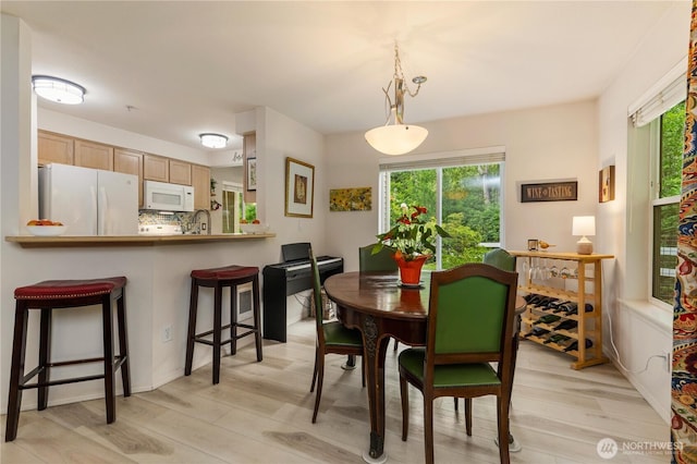 723 114th St SW Unit Y101, Everett, WA 98204 - dining area with light wood-style flooring