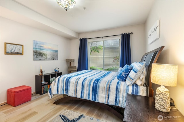 723 114th St SW Unit Y101, Everett, WA 98204 - bedroom featuring wood finished floors and baseboards