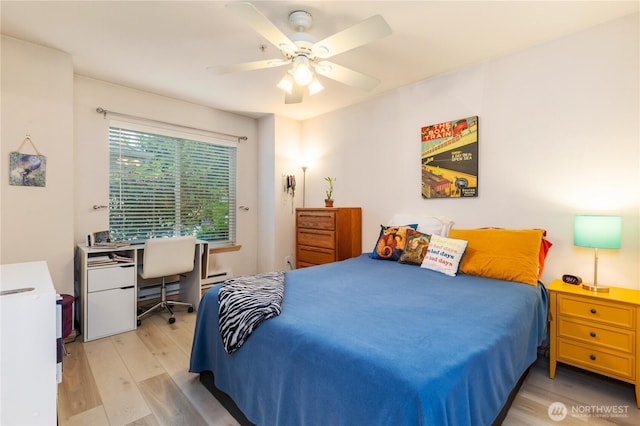 723 114th St SW Unit Y101, Everett, WA 98204 - bedroom with light wood-style flooring, an office area, and ceiling fan