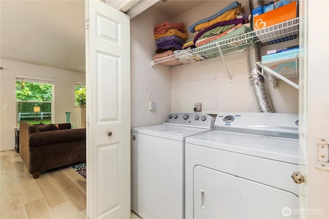 723 114th St SW Unit Y101, Everett, WA 98204 - washroom featuring washer and dryer and light wood-style floors