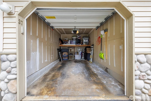 723 114th St SW Unit Y101, Everett, WA 98204 - garage featuring a garage door opener