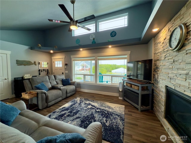 1155 Greenview Ave SW, Ocean Shores, WA 98569 - living room with a fireplace, ceiling fan, high vaulted ceiling, and wood finished floors