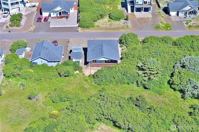 1155 Greenview Ave SW, Ocean Shores, WA 98569 - aerial view of residential area with a forest
