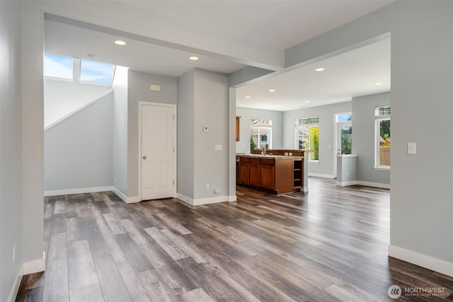 1130 77th Dr SE, Lake Stevens, WA 98258 - unfurnished living room with dark wood-style floors and recessed lighting