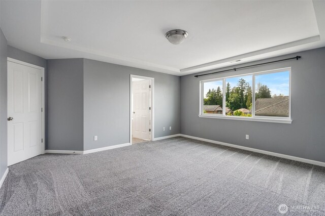 1130 77th Dr SE, Lake Stevens, WA 98258 - unfurnished room with a raised ceiling, carpet floors, and a smoke detector