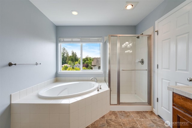 1130 77th Dr SE, Lake Stevens, WA 98258 - bathroom featuring a garden tub, a stall shower, vanity, and recessed lighting