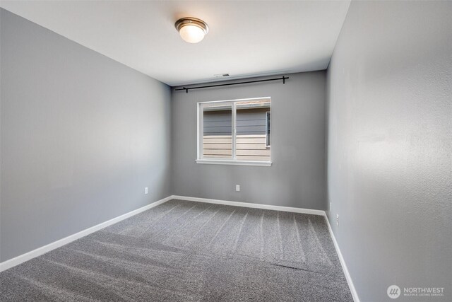 1130 77th Dr SE, Lake Stevens, WA 98258 - spare room featuring carpet floors and baseboards