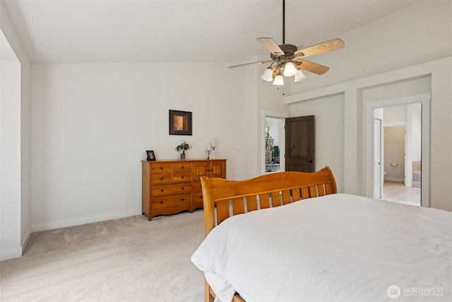 6518 73rd Ave E, Olympia, WA 98516 - bedroom featuring light carpet, vaulted ceiling, and a ceiling fan