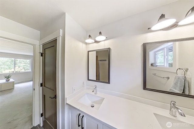 6518 73rd Ave E, Olympia, WA 98516 - bathroom featuring healthy amount of natural light and double vanity