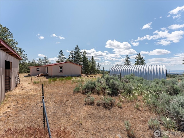 115 Hummingbird Rd, East Wenatchee, WA 98802 - view of yard featuring an outdoor structure