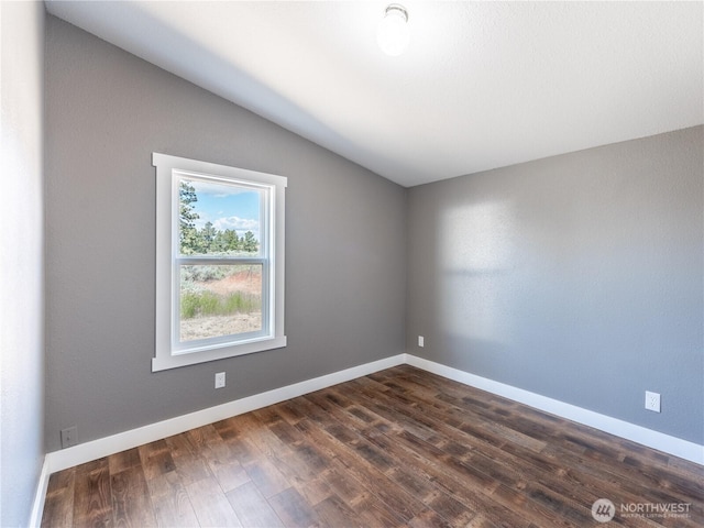 115 Hummingbird Rd, East Wenatchee, WA 98802 - empty room featuring lofted ceiling and dark wood finished floors