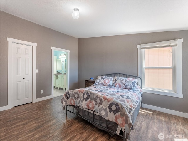 115 Hummingbird Rd, East Wenatchee, WA 98802 - bedroom with wood finished floors and connected bathroom