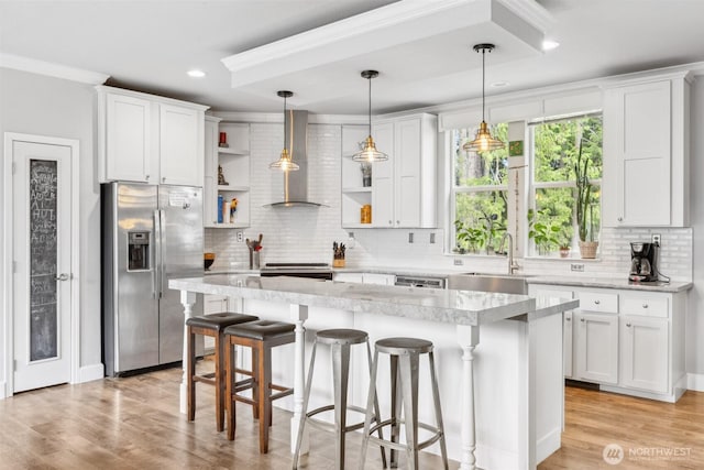 1966 Hooker Rd, Sequim, WA 98382 - kitchen featuring stainless steel fridge with ice dispenser, open shelves, wall chimney range hood, light countertops, and tasteful backsplash