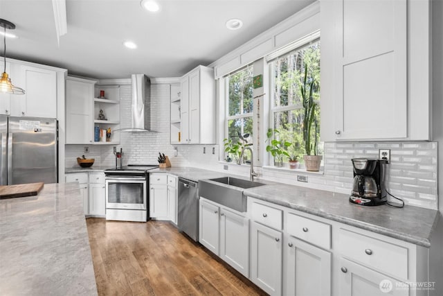 1966 Hooker Rd, Sequim, WA 98382 - kitchen featuring stainless steel appliances, wall chimney range hood, open shelves, backsplash, and white cabinets
