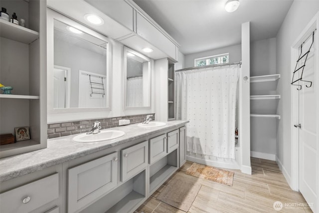 1966 Hooker Rd, Sequim, WA 98382 - full bathroom with double vanity, curtained shower, and backsplash