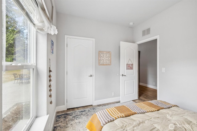 1966 Hooker Rd, Sequim, WA 98382 - bedroom featuring wood finished floors and baseboards