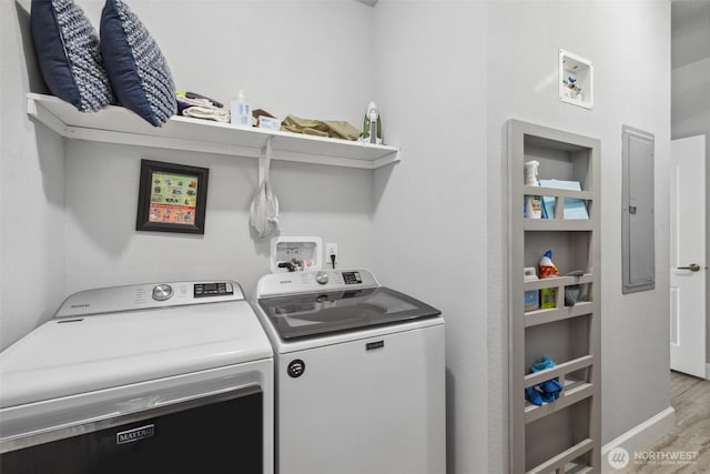 1966 Hooker Rd, Sequim, WA 98382 - laundry room featuring washer and clothes dryer and wood finished floors