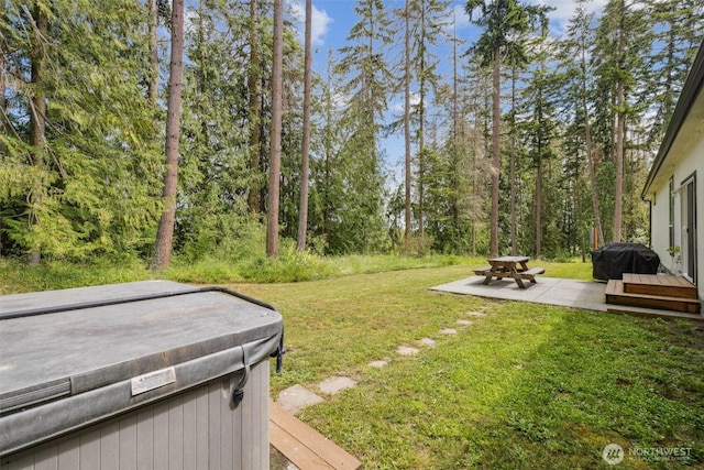 1966 Hooker Rd, Sequim, WA 98382 - view of grassy yard with a hot tub and a patio