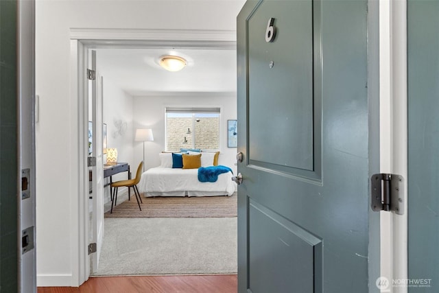 1125 N 93rd St Unit 6, Seattle, WA 98103 - bedroom with wood finished floors and baseboards