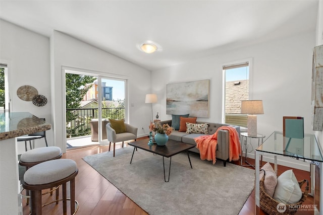 1125 N 93rd St Unit 6, Seattle, WA 98103 - living room featuring lofted ceiling and wood finished floors