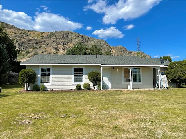 59G Copple Rd, Omak, WA 98841 - back of property with a yard, a mountain view, a porch, and cooling unit