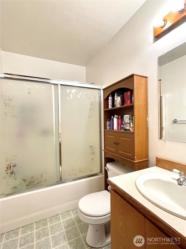 59G Copple Rd, Omak, WA 98841 - bathroom featuring vanity and bath / shower combo with glass door